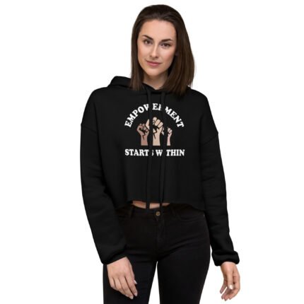 Empowered Women's Crop Hoodie in black with raw hem and matching drawstrings, showcasing a stylish dropped shoulder cut.